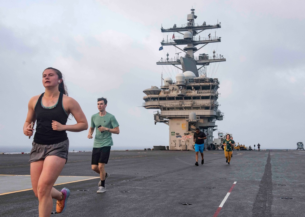 USS Ronald Reagan (CVN 76) Sailor commence flight deck PT