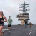 USS Ronald Reagan (CVN 76) Sailor commence flight deck PT