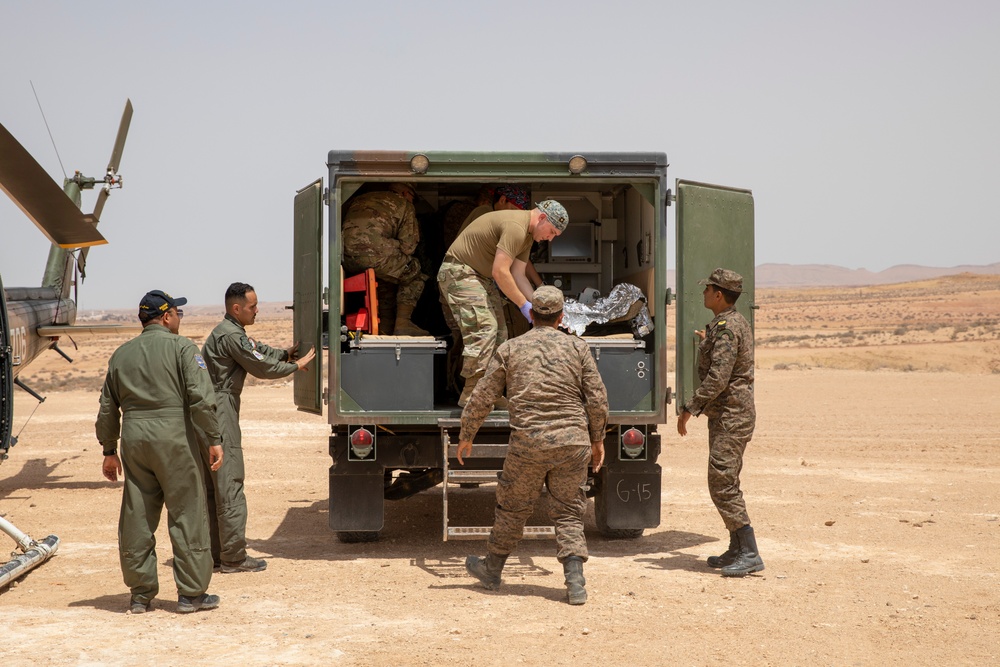 903rd MD and Tunisian forces conduct simulated medevac during African Lion 23