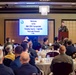 Rear Adm. Kevin Lenox speaks during a Brunch at the 2023 NHA Symposium