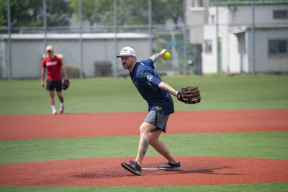 Sailors Participate In A Softball Game During A Port Visit To Japan