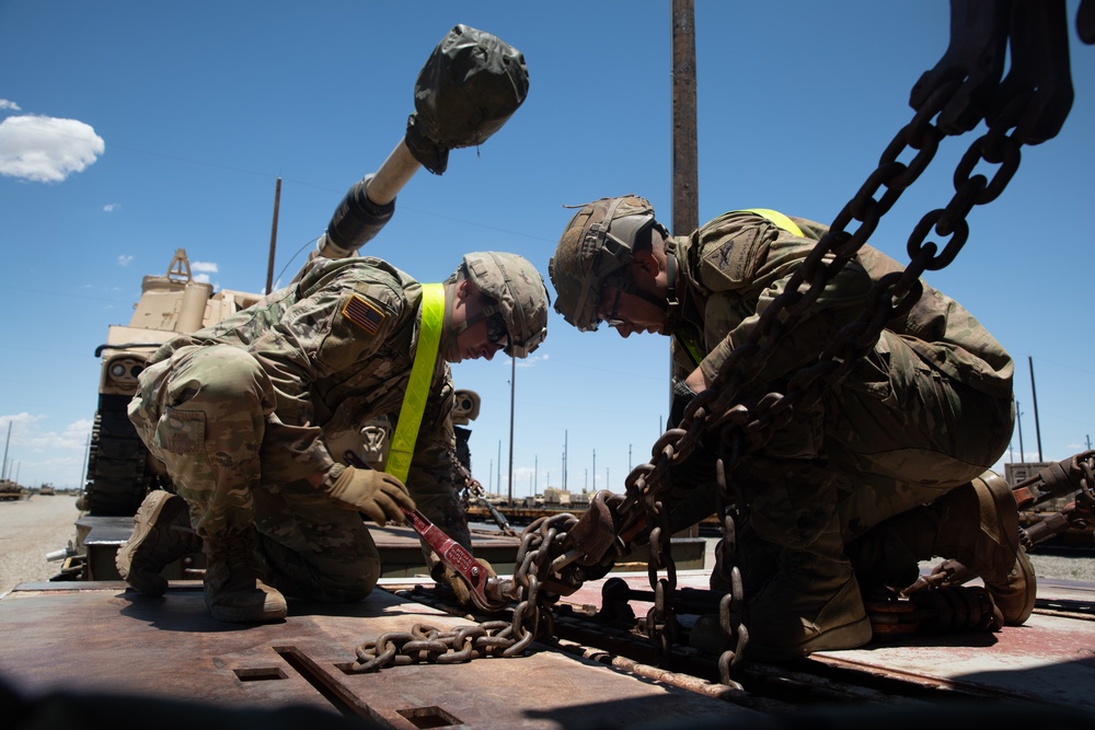 Soliders perform railway operations in preparation for deployment