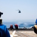 USS Rpbert Smalls (CG 62) Conducts HIFR with HSM-77 SaberHawks