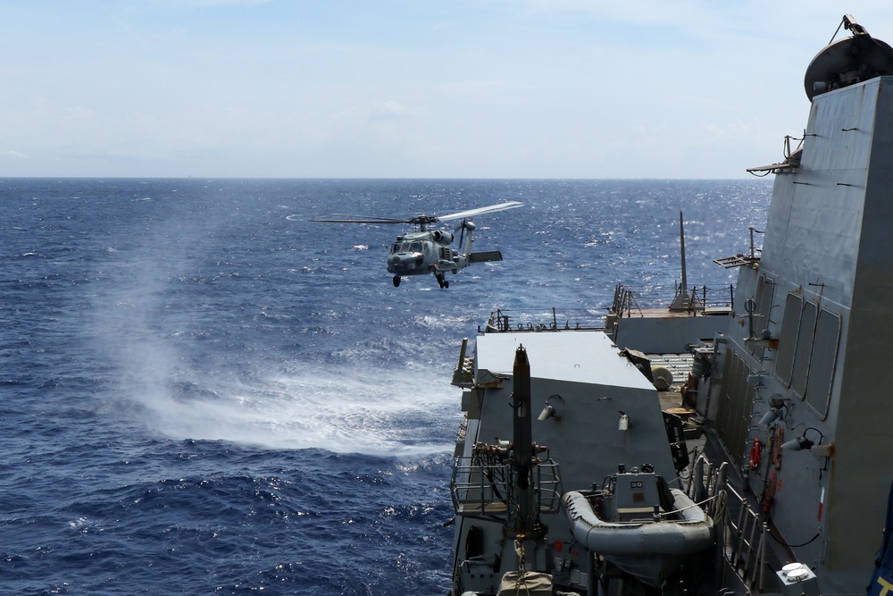 USS Chung-Hoon conducts Surface Action Group operations with the Royal Australian Navy