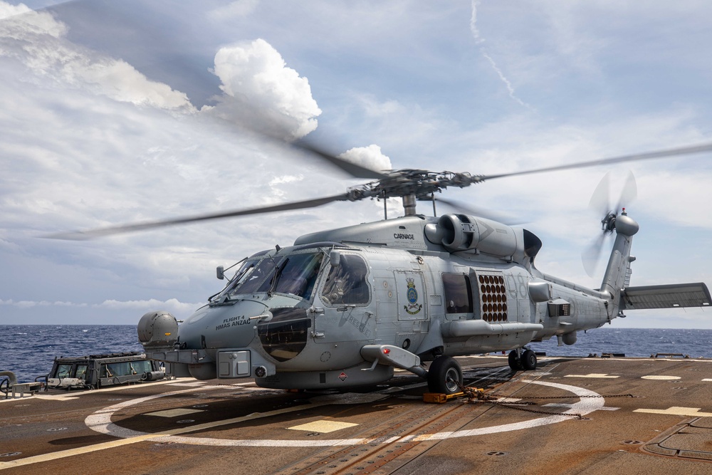 USS Chung-Hoon conducts Surface Action Group operations with the Royal Australian Navy