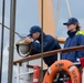 Crew members aboard USCGC Eagle stand watch during transit out of Norwegian waters