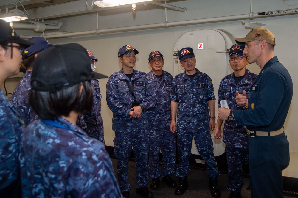 USS Ronald Reagan (CVN 76) Sailors host a tour with members of the Izumo (DDH 183)