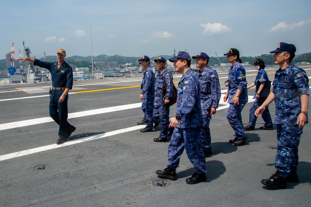 USS Ronald Reagan (CVN 76) Sailors host a tour with members of the Izumo (DDH 183)