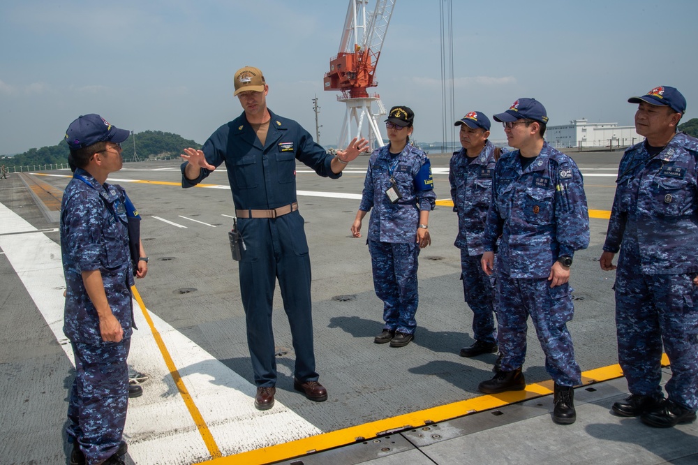 USS Ronald Reagan (CVN 76) Sailors host a tour with members of the Izumo (DDH 183)