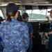 USS Ronald Reagan (CVN 76) Sailors host a tour with members of the Izumo (DDH 183)