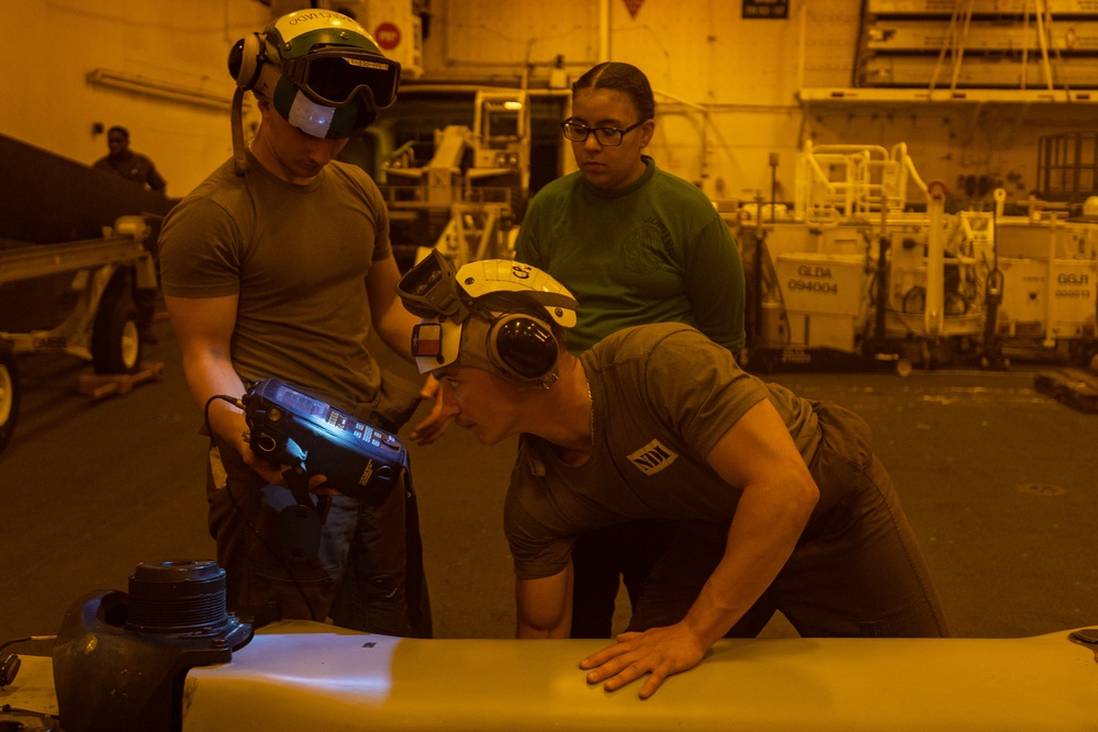 USS Bataan Sailor and 26th MEU Marines conduct nondestructive inspection