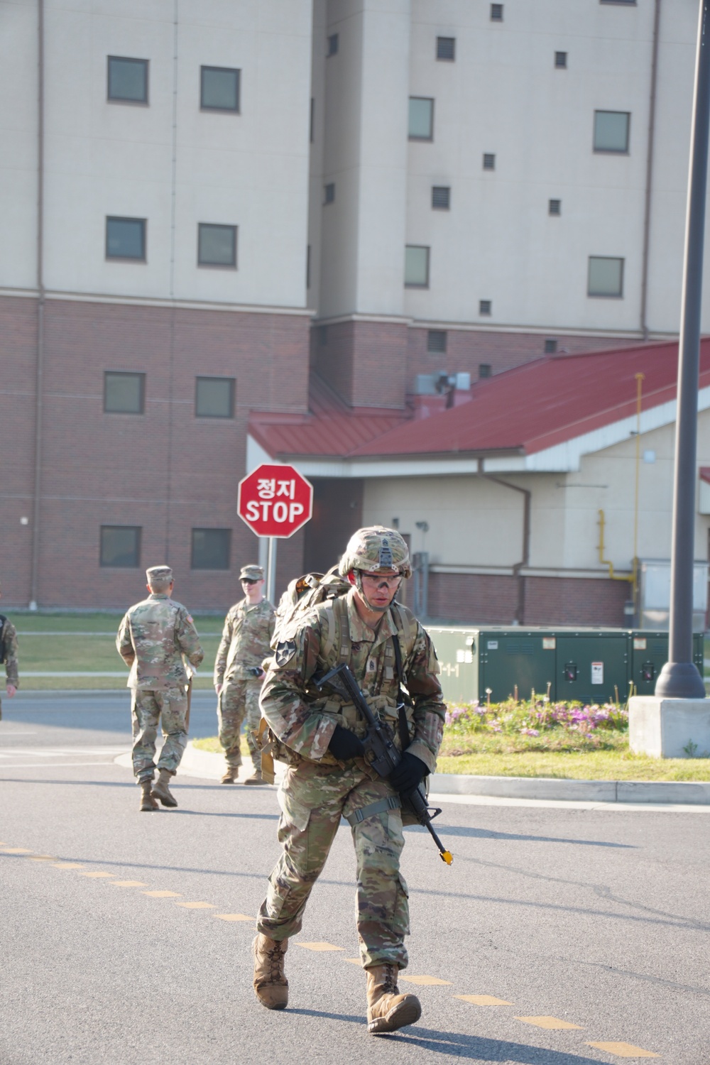 Command Sgt. Major Ryan Cole finishes the EFMB ruck march