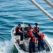 USCGC Eagle crew members conduct small boat operations