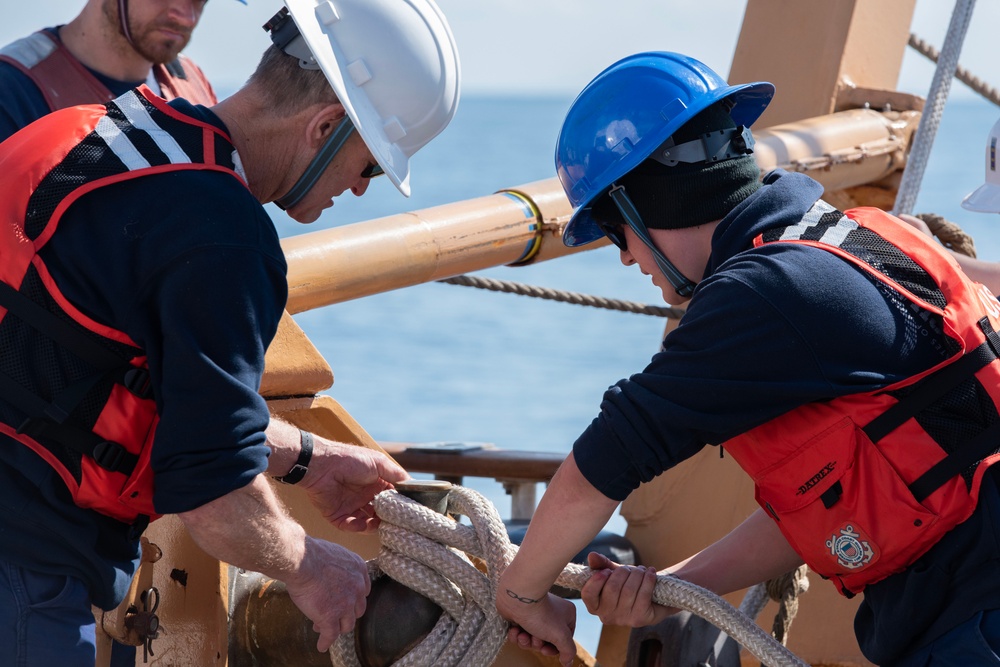 USCGC Eagle crew members conduct small boat operations