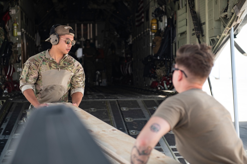 449th AEG port dogs conduct cargo load