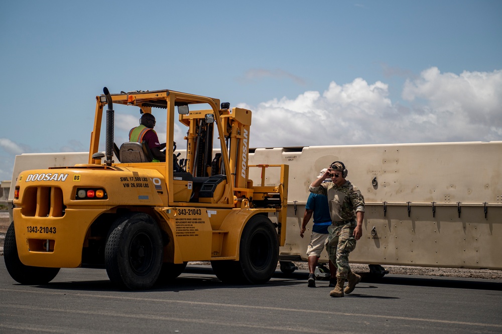 449th AEG port dogs conduct cargo load