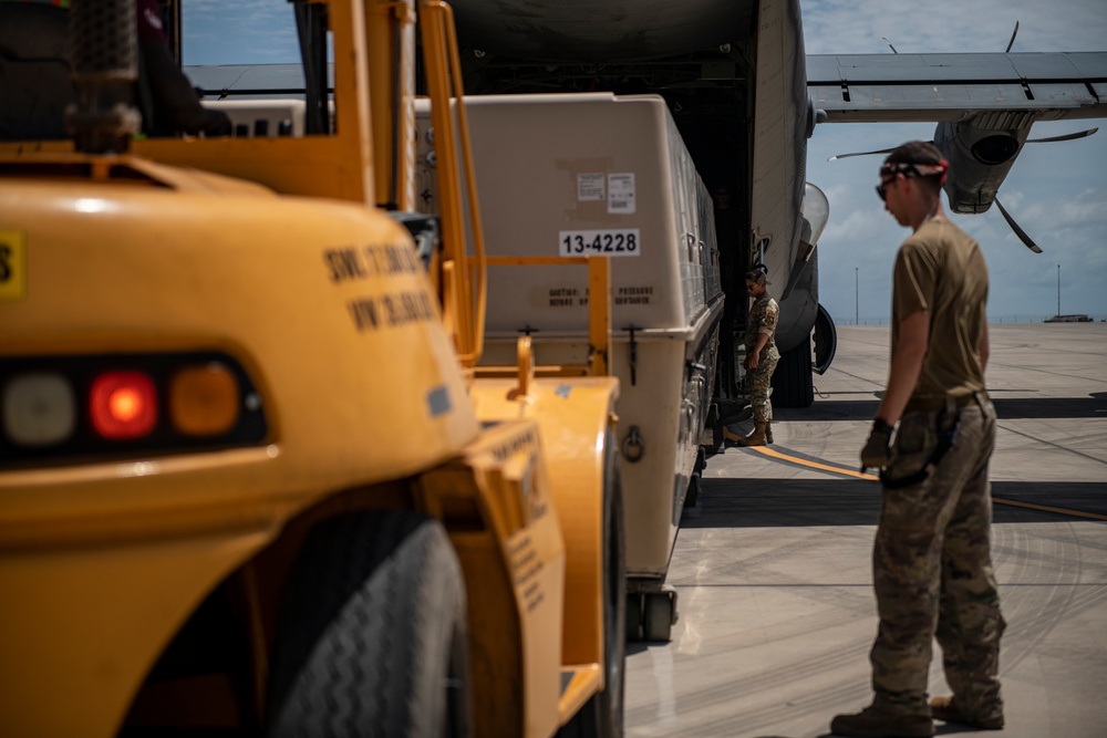 449th AEG port dogs conduct cargo load