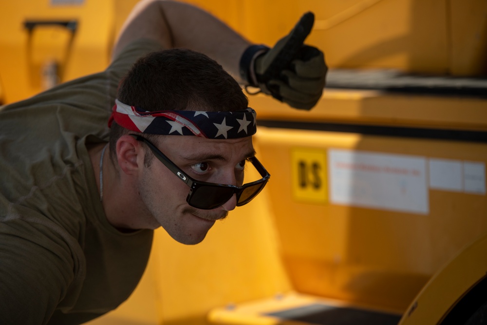 449th AEG port dogs conduct cargo load