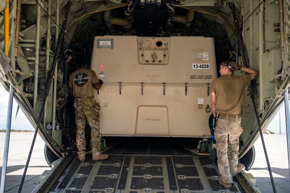 449th AEG port dogs conduct cargo load