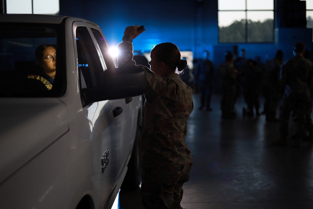 Arkansas Army National Guard 1st Lt. Rachel Cole conducts a demonstrative traffic stop at Camp Robinson, Arkansas on 16 May, 2023