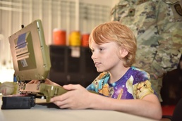 Elementary students learn about Army robotics during EOD visit