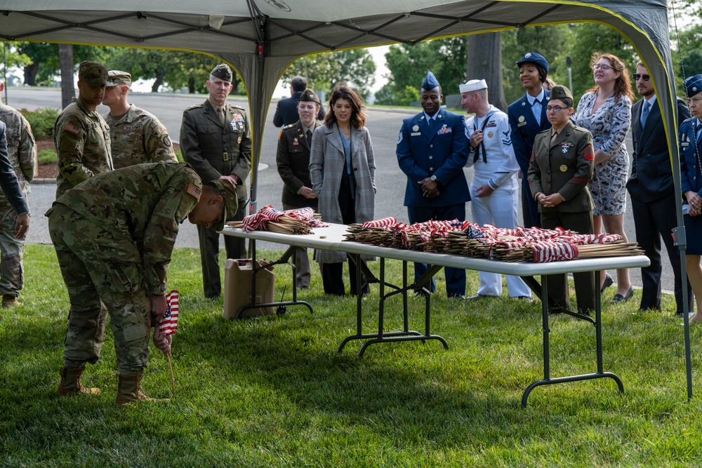 Deputy Secretary Hicks, staff place flags at Arlington National Cemetery