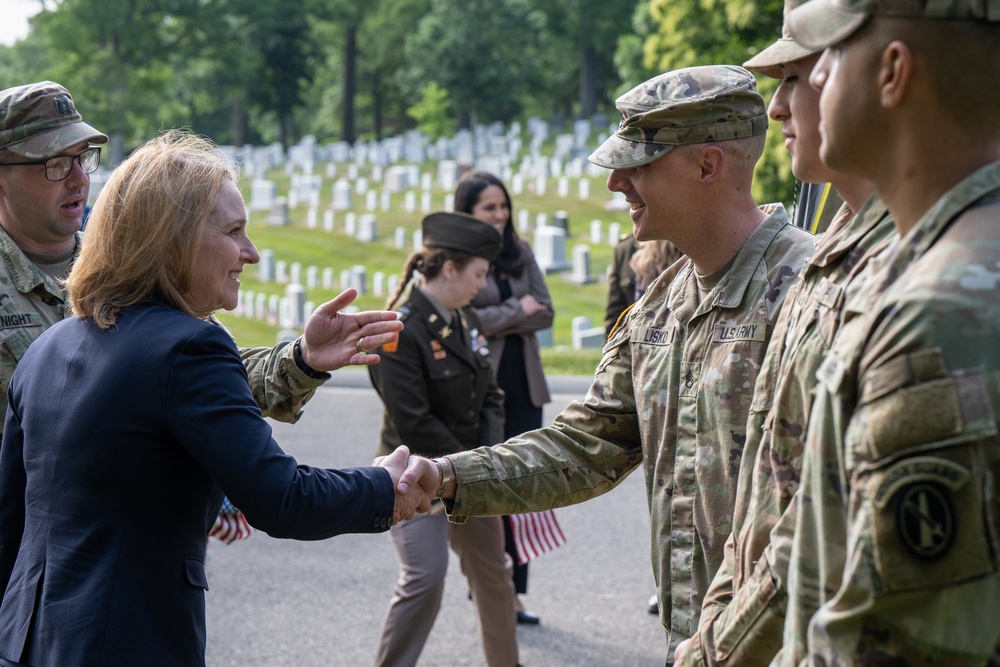 Deputy Secretary Hicks, staff place flags at Arlington National Cemetery