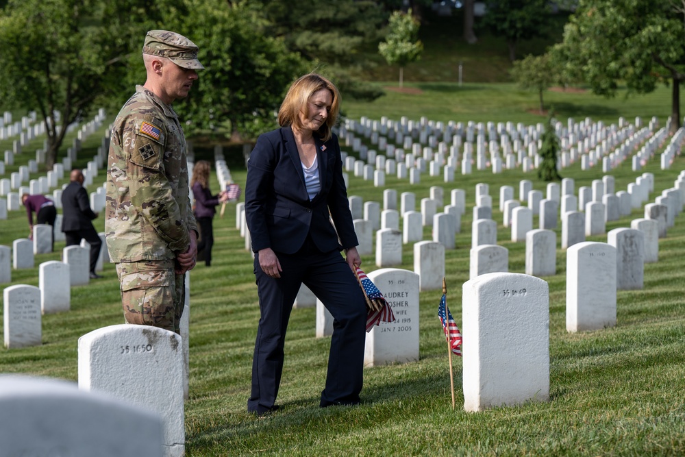 Deputy Secretary Hicks, staff place flags at Arlington National Cemetery