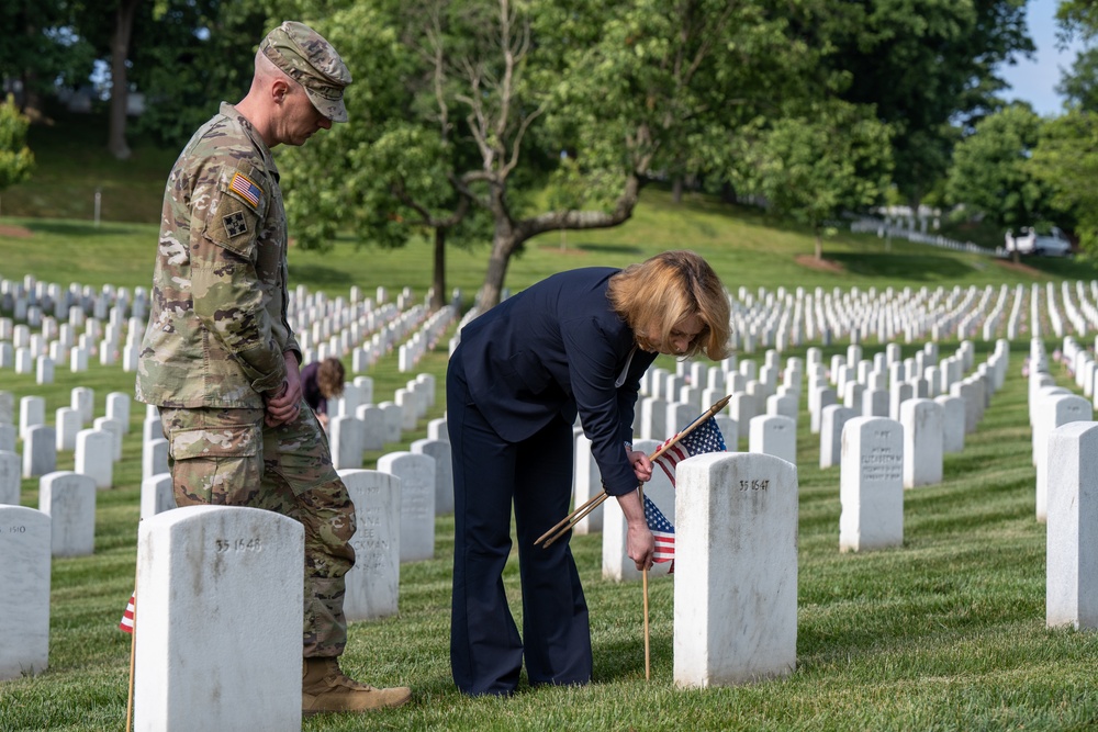 Deputy Secretary Hicks, staff place flags at Arlington National Cemetery