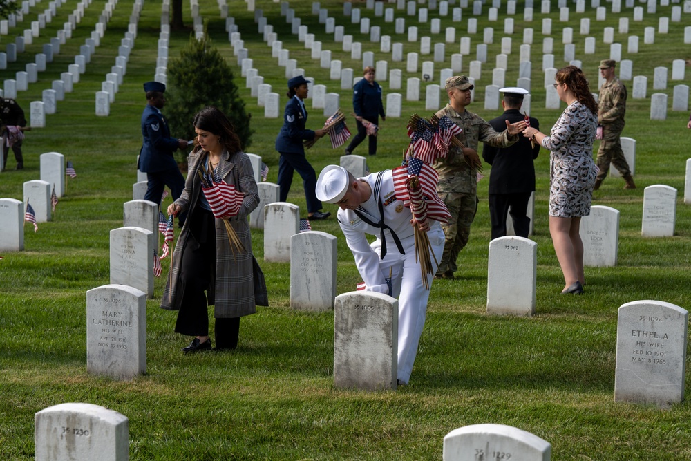 Deputy Secretary Hicks, staff place flags at Arlington National Cemetery