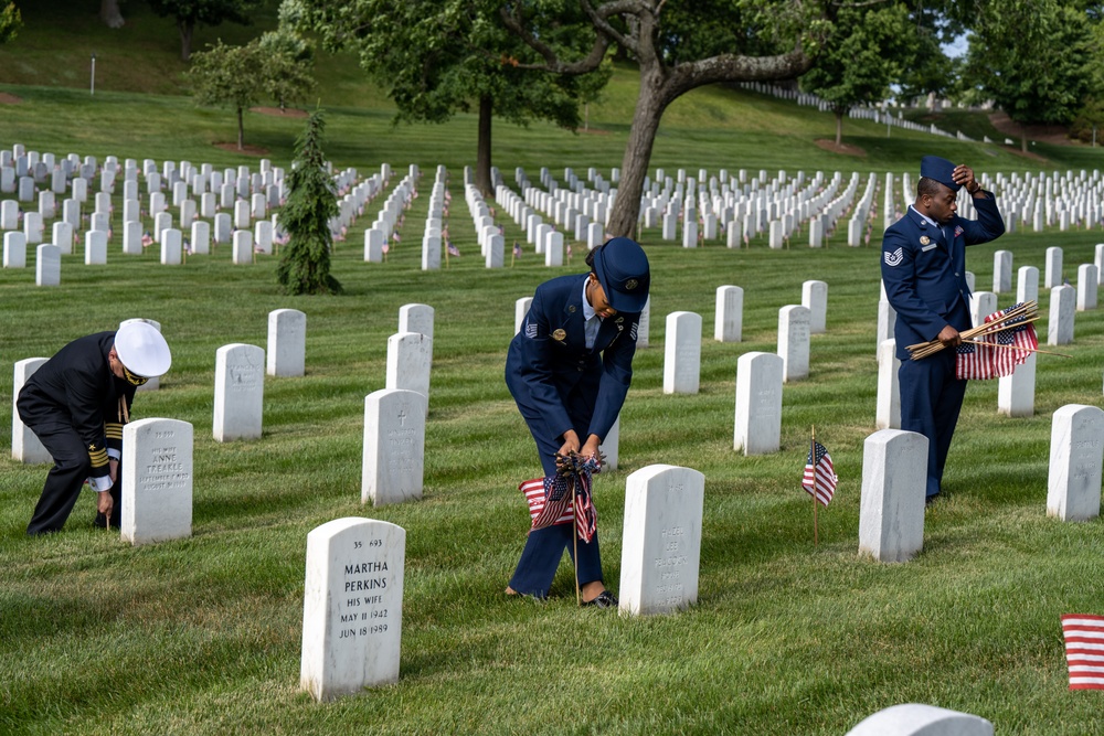 Deputy Secretary Hicks, staff place flags at Arlington National Cemetery