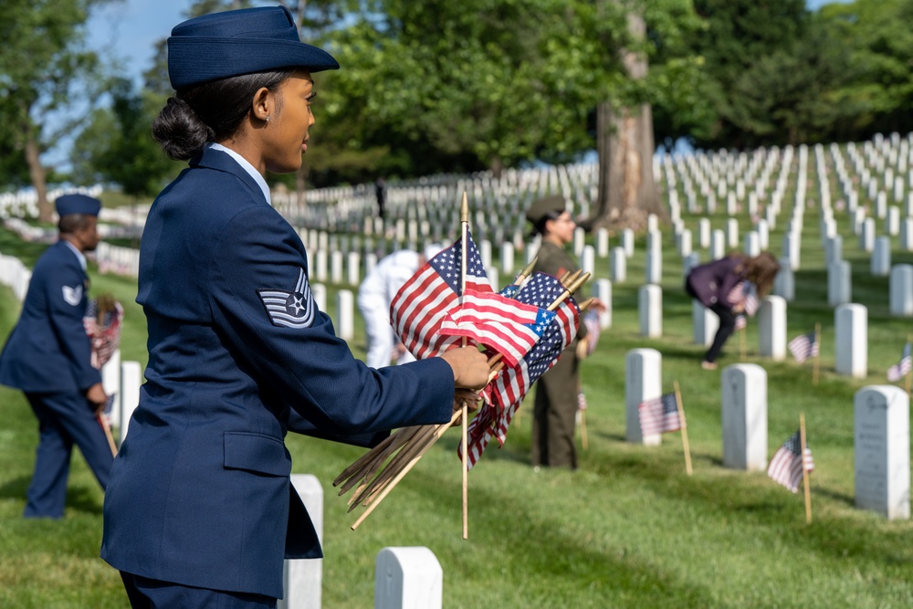 Deputy Secretary Hicks, staff place flags at Arlington National Cemetery