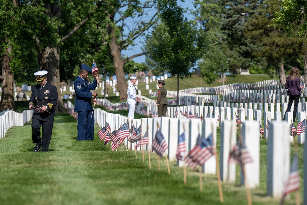 Deputy Secretary Hicks, staff place flags at Arlington National Cemetery