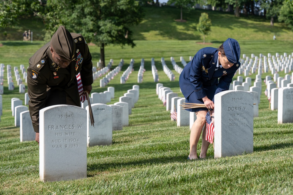 Deputy Secretary Hicks, staff place flags at Arlington National Cemetery