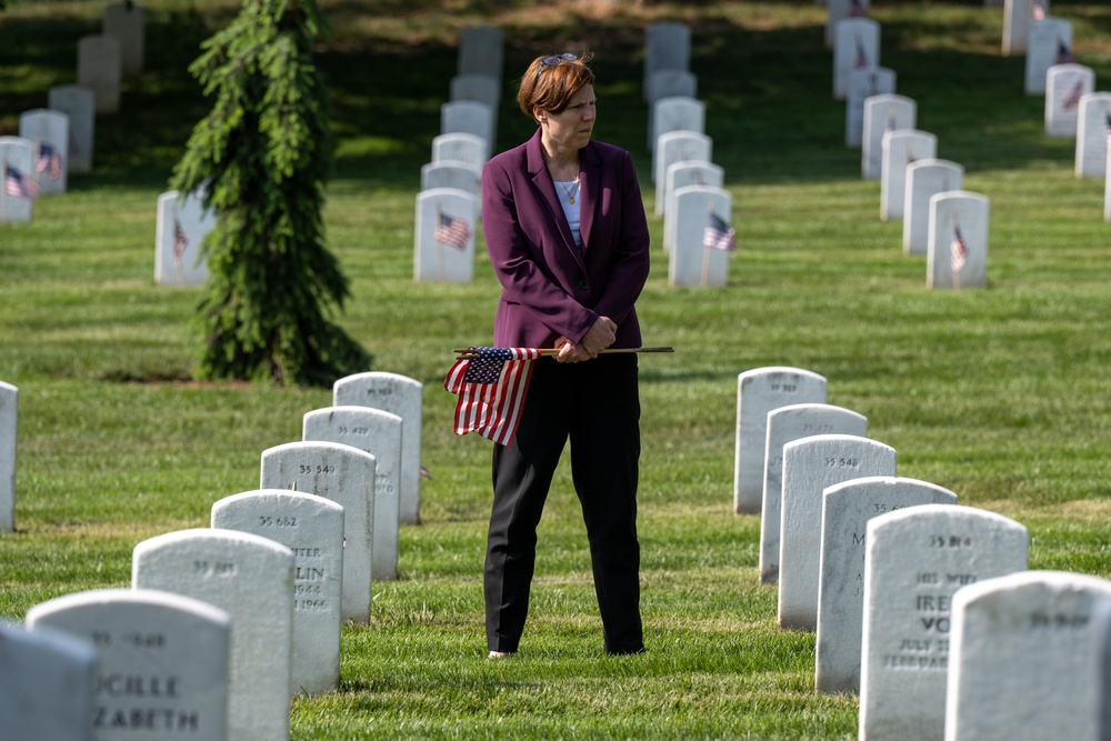 Deputy Secretary Hicks, staff place flags at Arlington National Cemetery