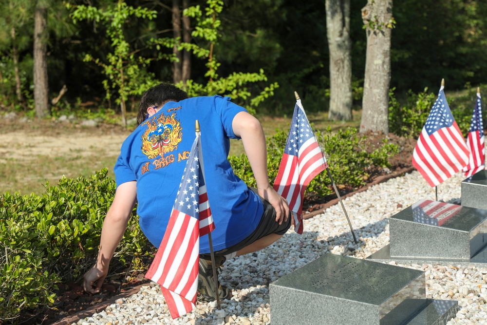 Boy Scout Troop 776 cleans up 3rd Special Forces Group (Airborne) Memorial Walk
