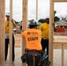 Sailors help Habitat For Humanity build homes