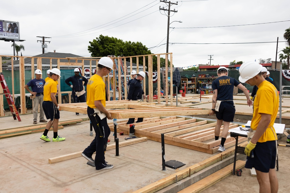 Sailors help Habitat For Humanity build homes