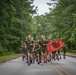 U.S. Marines and Sailors with 2nd Marine Logistics Group participate in a Motivational Regimental Run Honoring Memorial Day