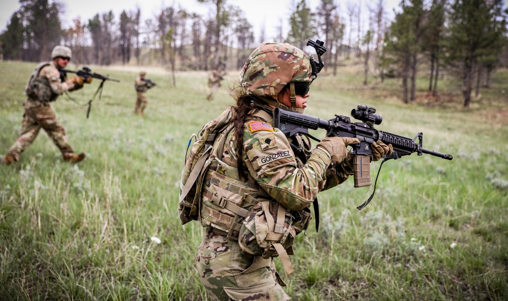 Iowa infantrywoman conducts squad live-fire exercise at Camp Guernsey