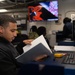 USS Ronald Reagan (CVN 76) Sailors process administrative documents