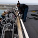USS Bataan Sailors fake out fuel hoses