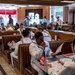 Sailors eat lunch at Ruby's Diner