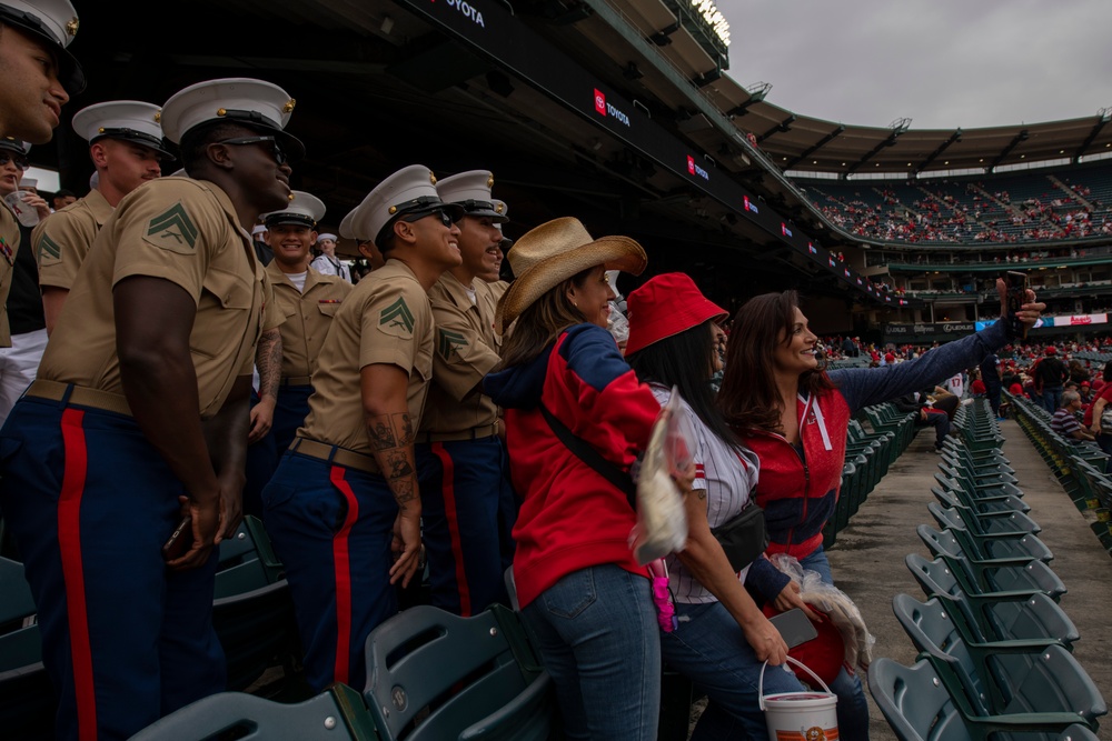 Sailors and Marine attend a Anaheim Angels game