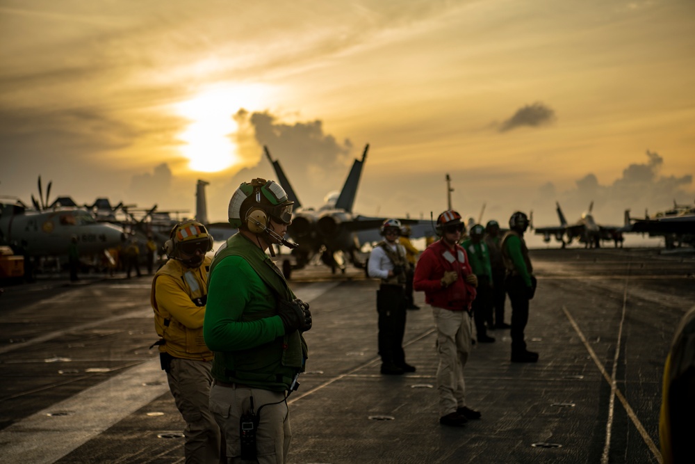 Sailors On Flight Deck During Sunset