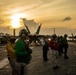 Sailors On Flight Deck During Sunset
