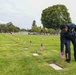 Sailors Place Flags on Service Member's Graves