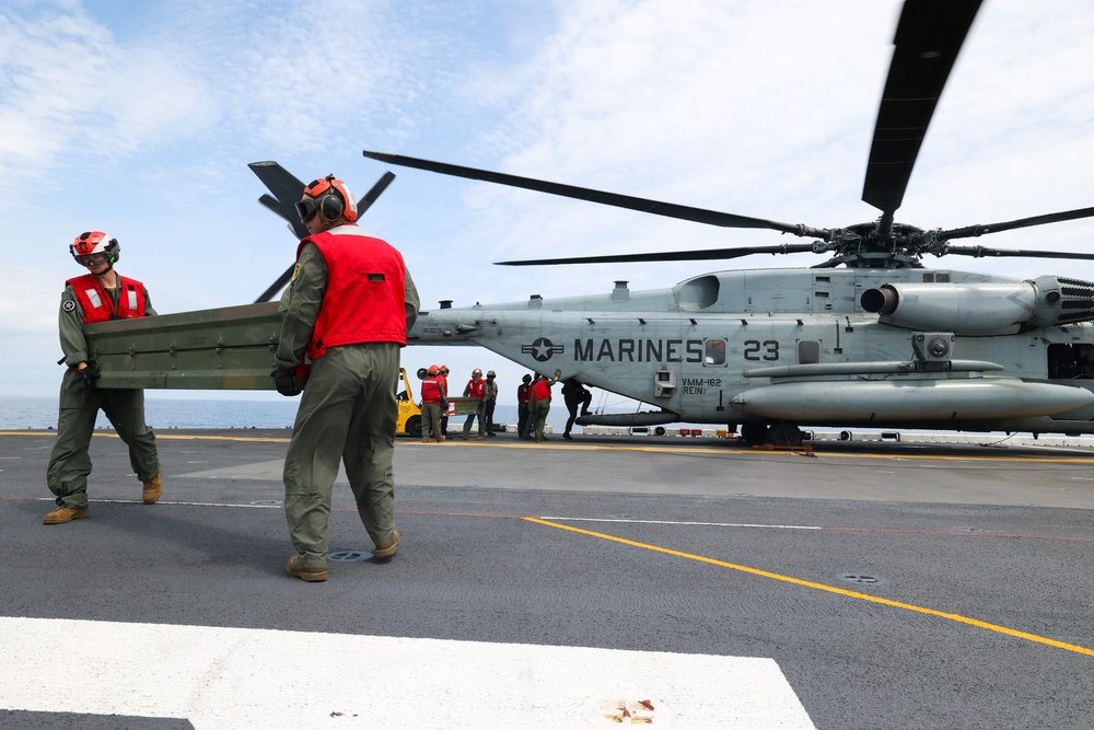 Marines Unloading Equipment