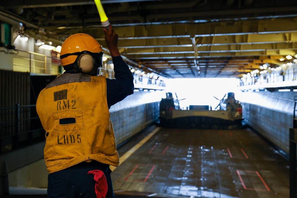 Boatswain's Mate Guides LCAC Into Well Deck