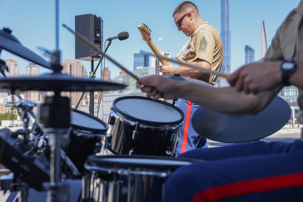 Quantico Marine Rock Band performs aboard the USS WASP (LHD 1) during Fleet Week